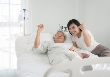 Happy patient in a hospital